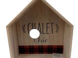 a small wooden box with a sign that says chalet