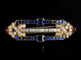 an image of a diamond, sapphire and ruby broochle