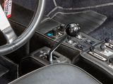 a steering wheel and dashboard of a car with a sticker on it
