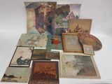 beaucoup de photos et de tableaux posés sur la table