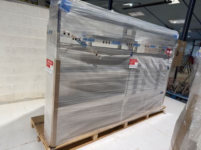 a pallet full of pallets and boxes in a warehouse