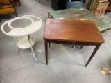 a table with a chair and a table with a chair on it
