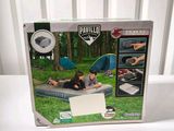 the box is open to show the contents of a camping set