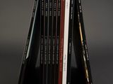 a stack of books sitting on top of each other on a table