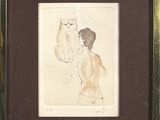 painting of a woman and a cat in a frame on a table