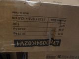 a cardboard box with a price label on it sitting on a table