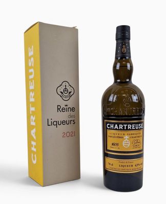 an image of a bottle of wine next to a cardboard box