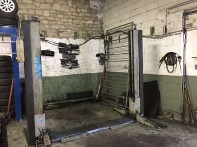 an image of a garage with a car in it