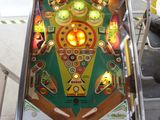 a pinball machine that is sitting on a table