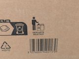a cardboard box with a picture of a person standing next to a trash can