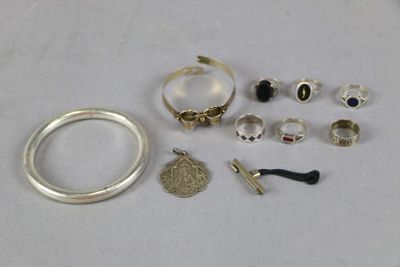 a lot of different rings and bracelets on the table
