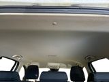 four seats in the back of a car with a sunroof