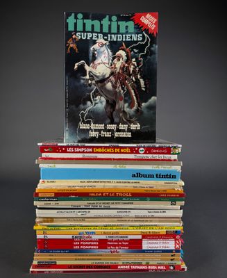 books stacked on top of each other on a black surface