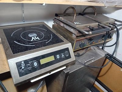 une image représentant une cuisinière surmontée d'un brûleur