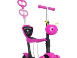 the pink scooter has two wheels and a handlebar