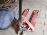a picture of a forklift sitting in a garage
