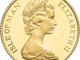 gros plan d'une pièce d'or avec un visage de femme
