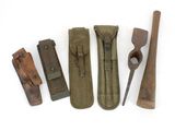 several different types of tools are laid out on a white surface