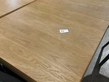 a table that has a piece of paper on top of it