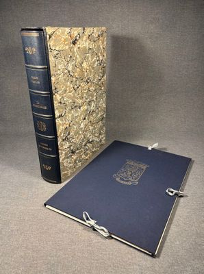 two books sitting on top of a table next to each other