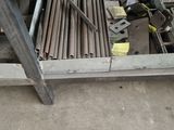 a metal table with a bunch of tools on it