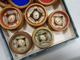 a box full of different types of watches on a table