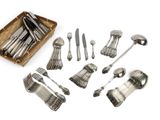 an assortment of silverware including forks, spoons and spoons