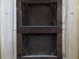 a picture of a picture of a wooden shelf in a room