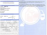 a close up of a document with a picture of a car