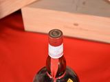a bottle of wine that is sitting on a table