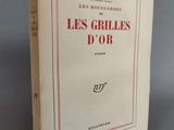 On voit ici la couverture du livre *Les grilles d'or*.