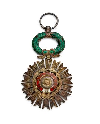 une image représentant une médaille entourée d'une couronne, sur fond blanc