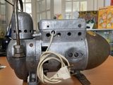 an old machine that is sitting on a table