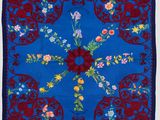 a blue and red floral design on a blue background
