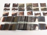 a lot of old photos on a white table