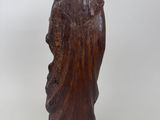 an old wooden statue of a woman with a veil on her head