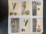 a picture of a collection of old postcards on a table