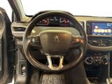 the interior of a car with a steering wheel and dashboard controls