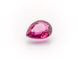 a pink tourmaline gems on a white background