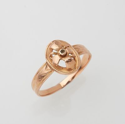 an image of a gold ring with a cross on it