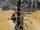 a gym with a lot of machines on the floor