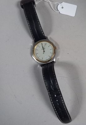 TITAN. montre bracelet d'homme en métal doré, le cadran à fo…