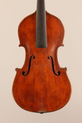 an old violin with a bow on a white background