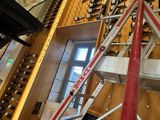 many wine bottles on the shelves in this wine cellar
