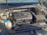 the engine of a car with its hood open and the hood up
