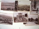 many old photos hanging on the wall of a building