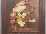 une peinture à l'huile représentant un vase de fleurs sur une table