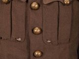 a close up of a military jacket with gold buttons