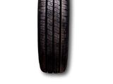 a close up of a tire on a white background