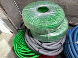 many hoses that are sitting on the ground